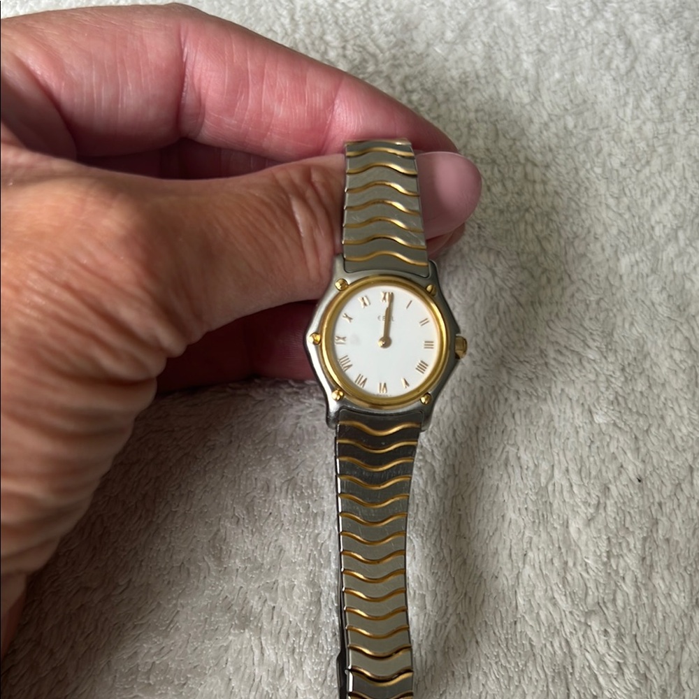 Ebel. Sport mini 18k Gold and stainless 23 mm